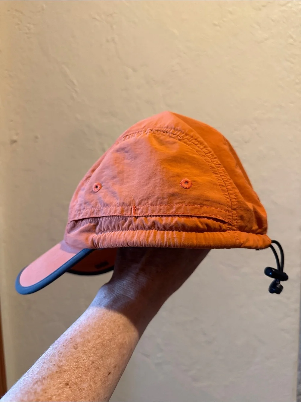 The North Face Orange Men's Trail Hat with Black Logo